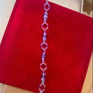 Handmade Bracelet, made with pink/purple crystals, bracelet is pink/purple.